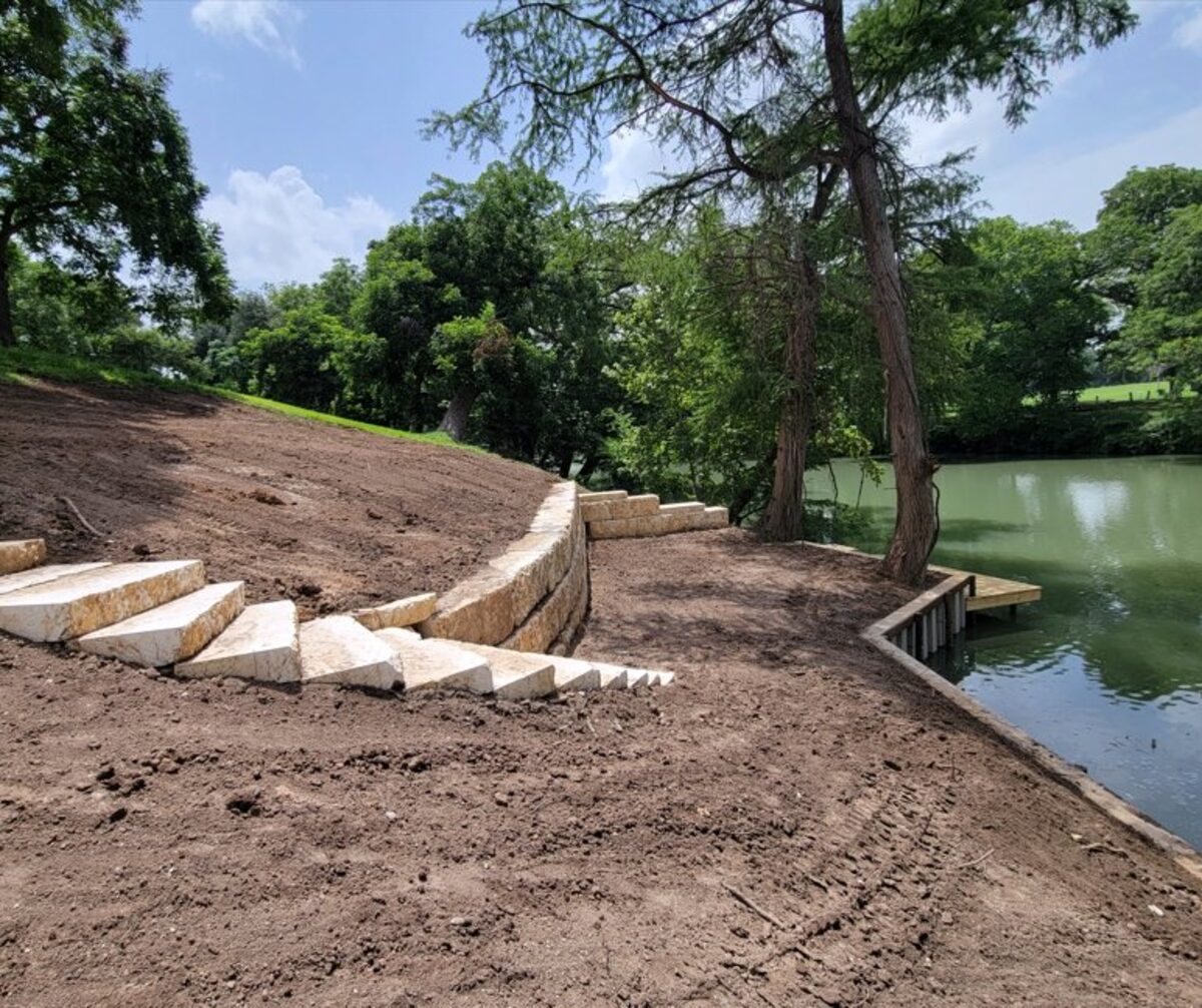 Limestone retaining wall with bulkhead on Lake McQueeney